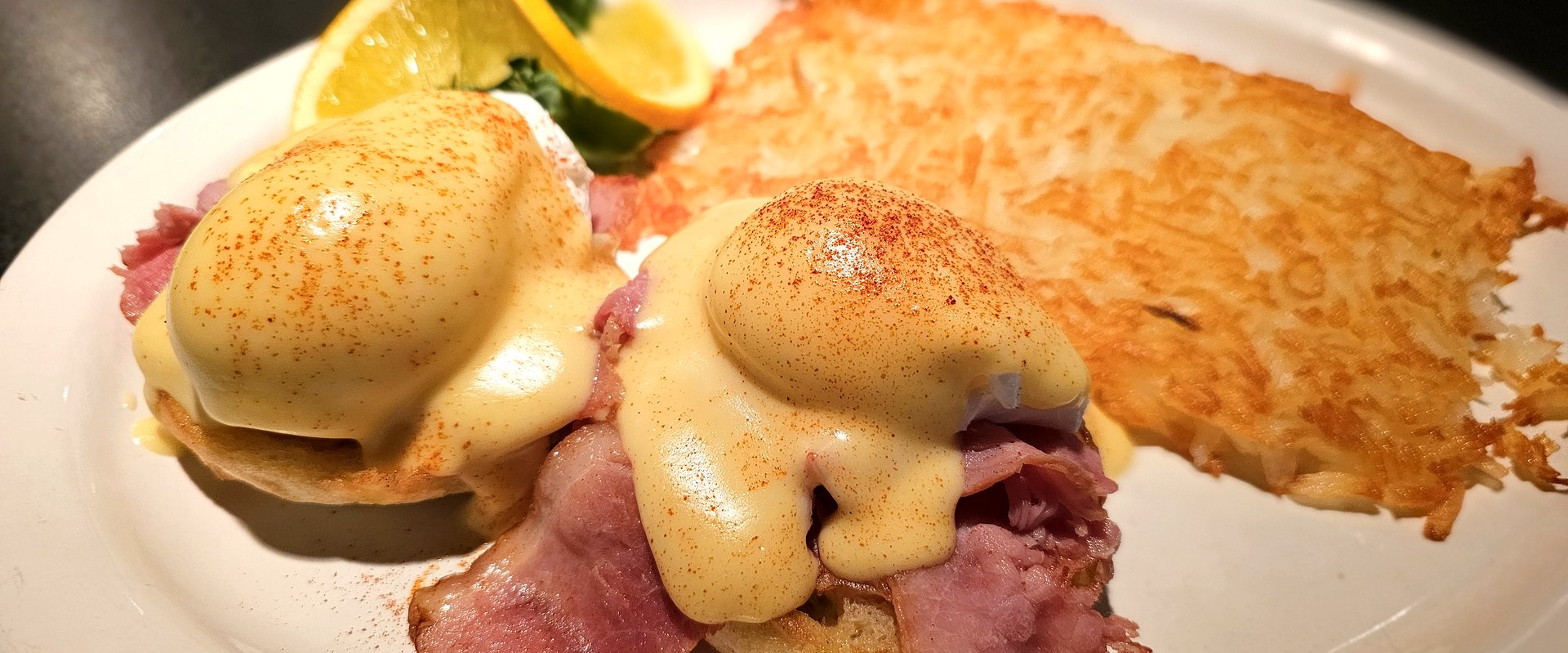 Eggs Benedict with hash browns at Matera