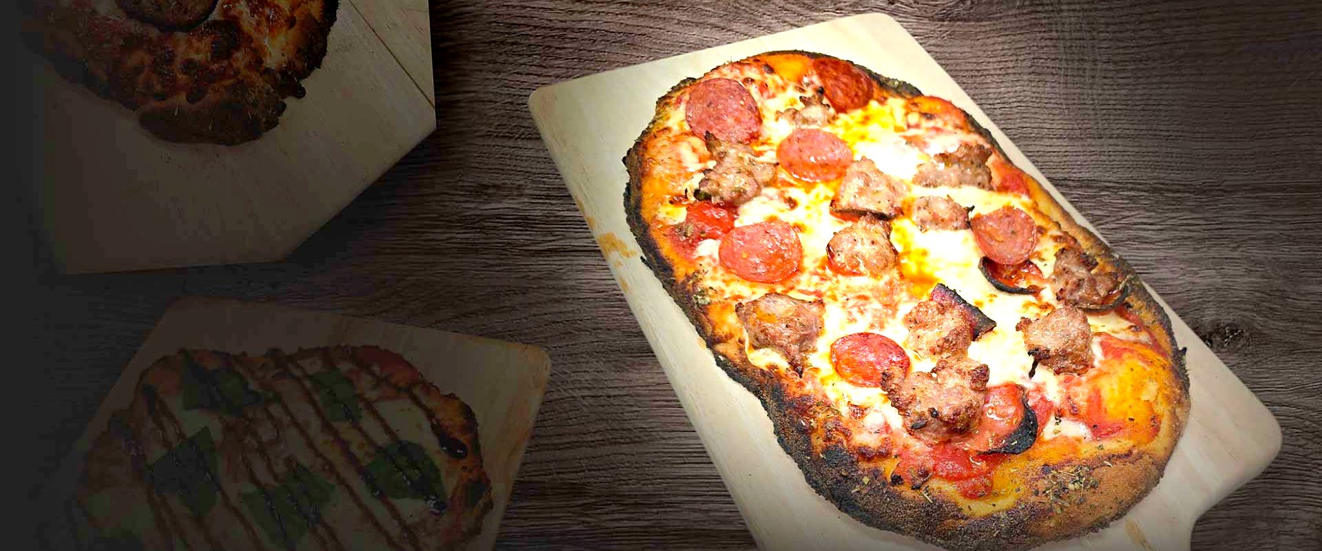 Roman style pepperoni and sausage pizza at Matera Grill