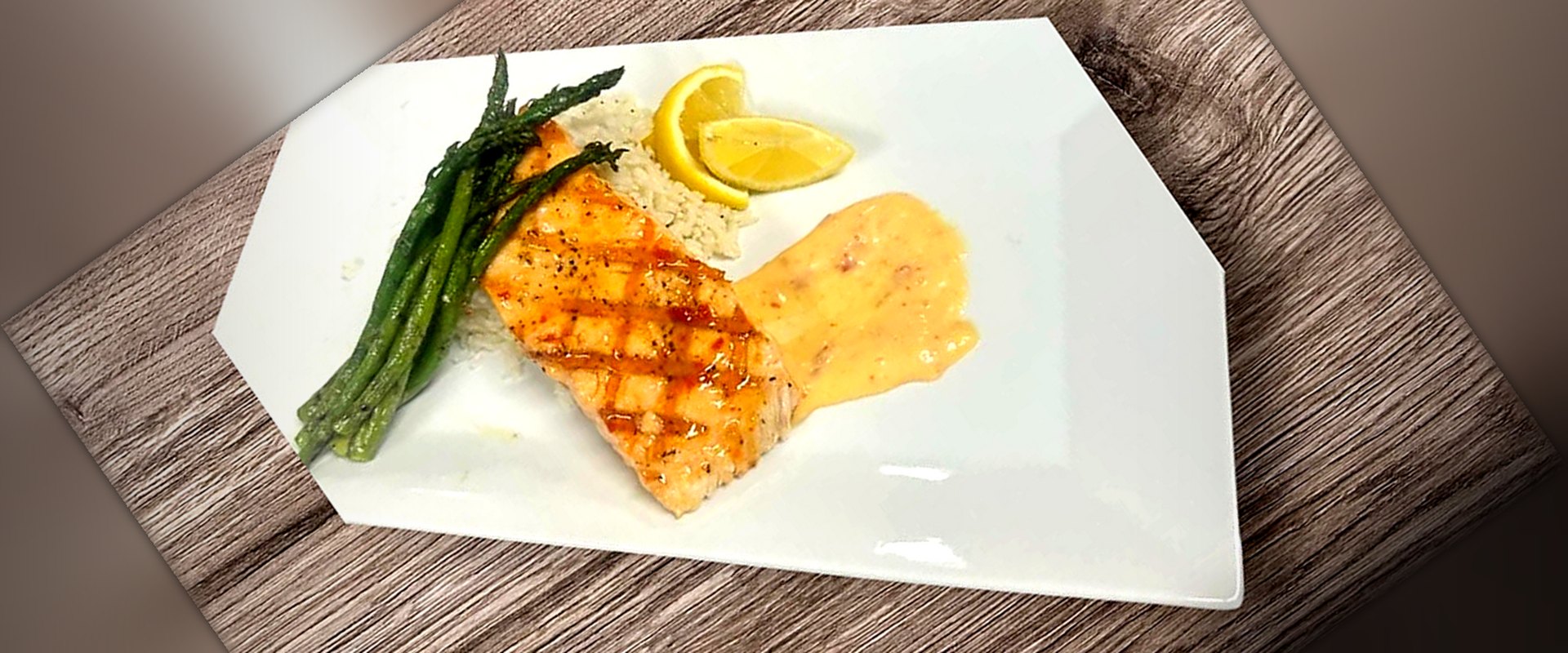 Sweet chili salmon with asparagus at Matera Grill