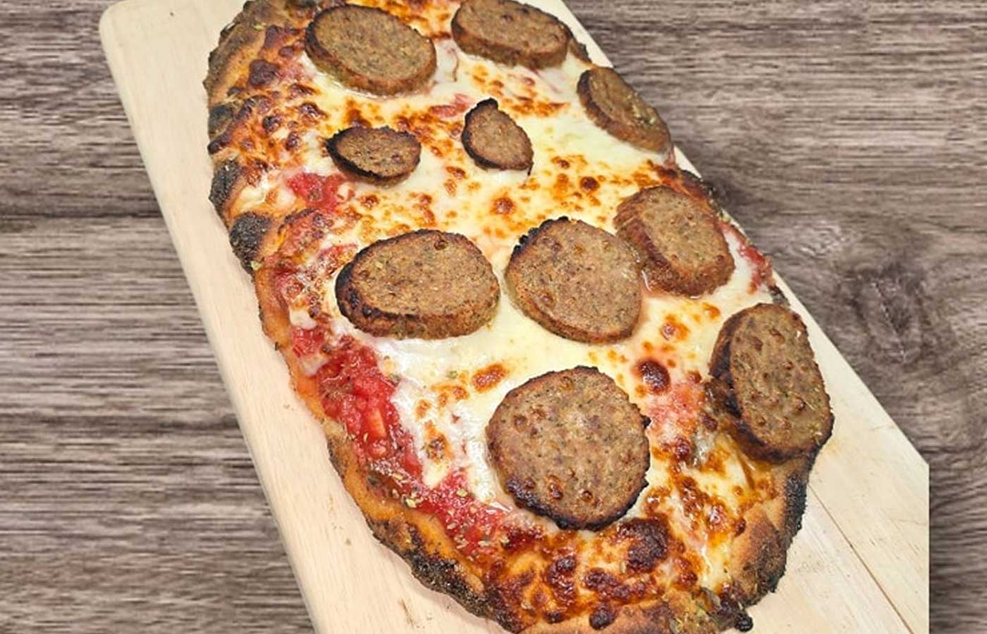 Roman style pizza topped with sliced meatballs served at Matera Grill and Italian Restaurant in Escanaba, MI