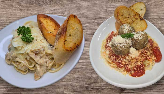 Chicken alfredo pasta and spaghetti meatballs entrees served at Matera Grill and Italian Restaurant in Escanaba, MI