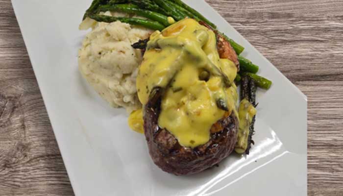 Steak oscar with mashed potatoes and asparagus served at Matera Grill and Italian Restaurant in Escanaba, MI
